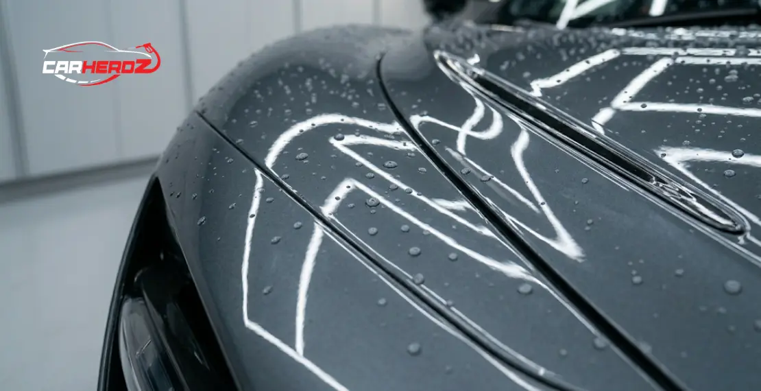 ceramic coating layer on car paint glossy surface close up detailing garage